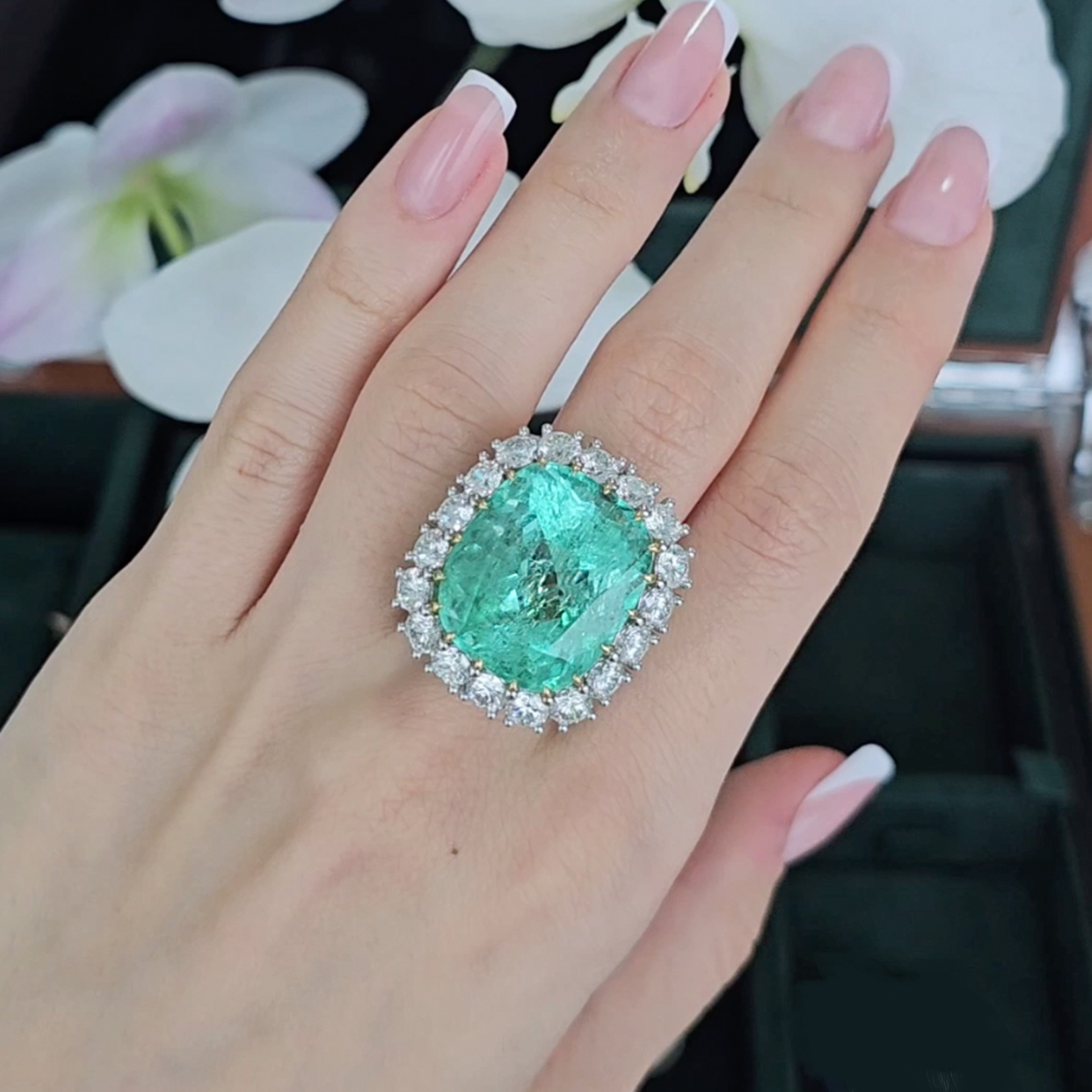 Ring with unique emerald and diamonds